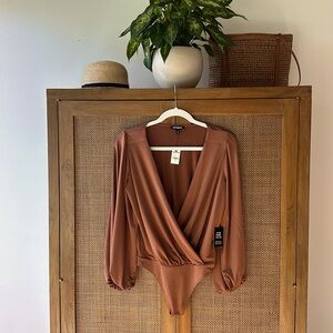 Bronze bodysuit with puffy sleeves